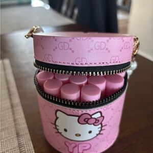 Hello Kitty carrier with beaded white handle
Hold 20 lip gloss NWOT